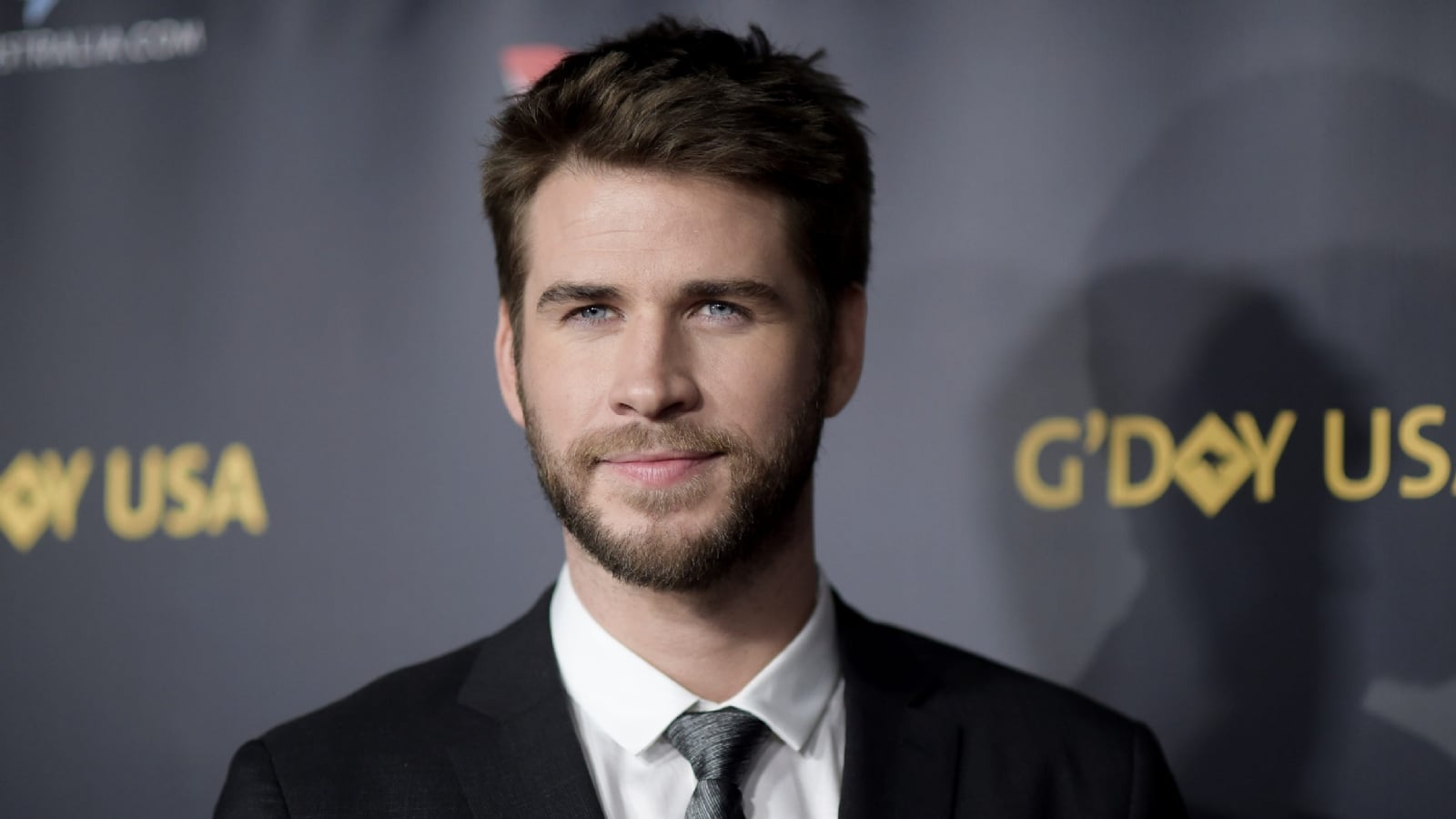 Liam-Hemsworth-pareja-Foto-Archivo
