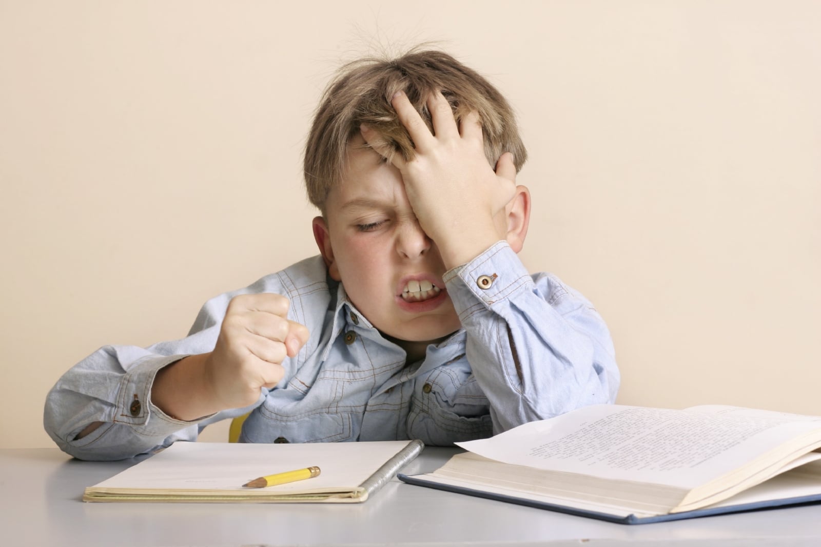 frustrated-boy-studying