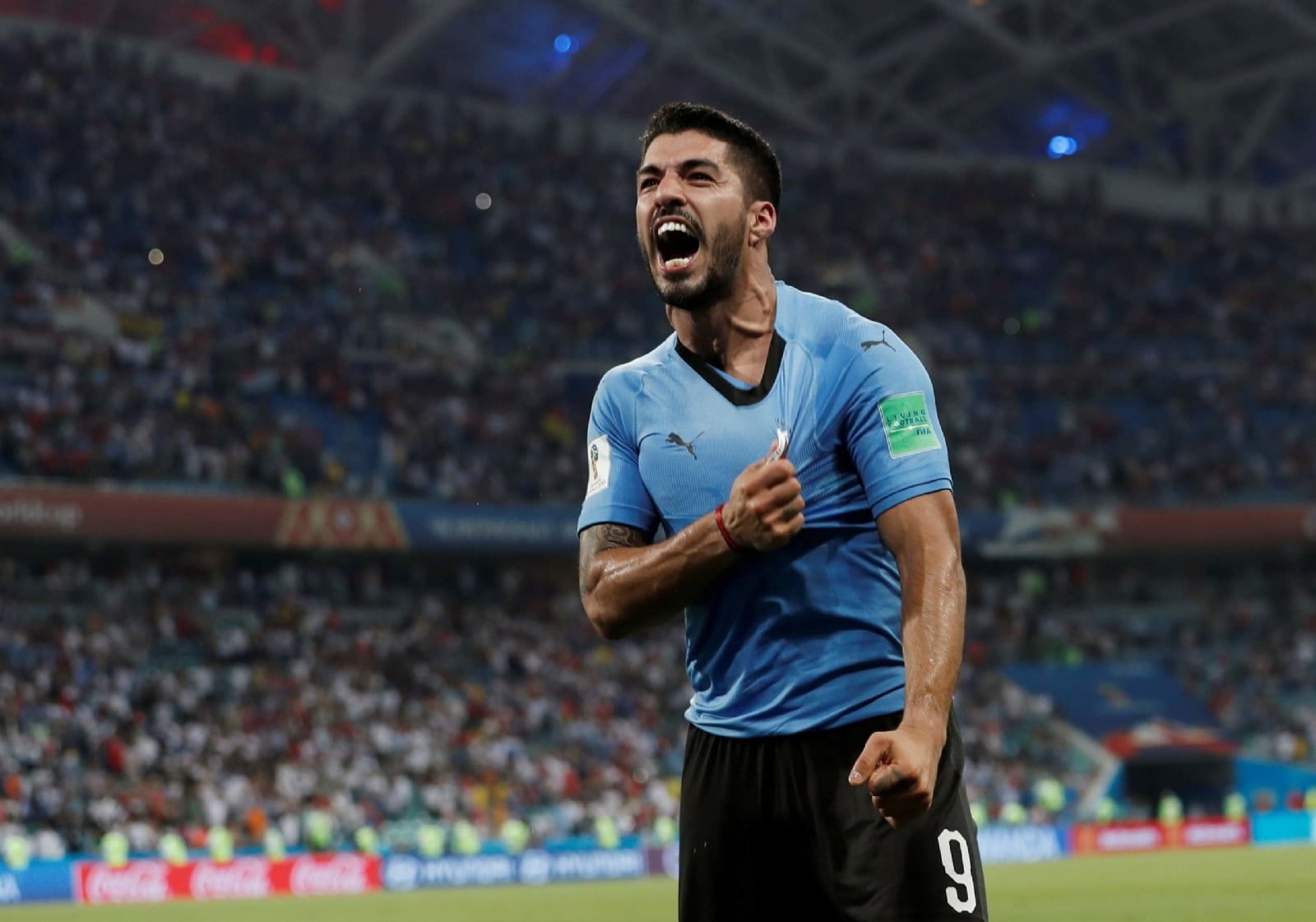 luis-suarez-celebra-uruguay-puma-reuters-scaled