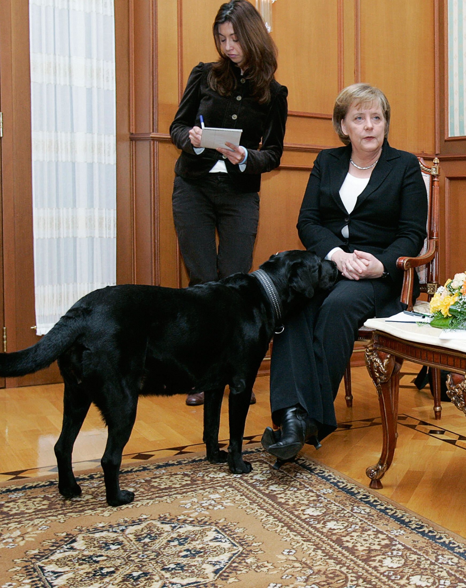 160112114220-merkel-putin-dog-2
