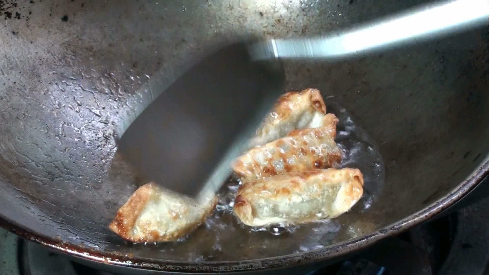 fried-dumplings-in-a-pan-free-video