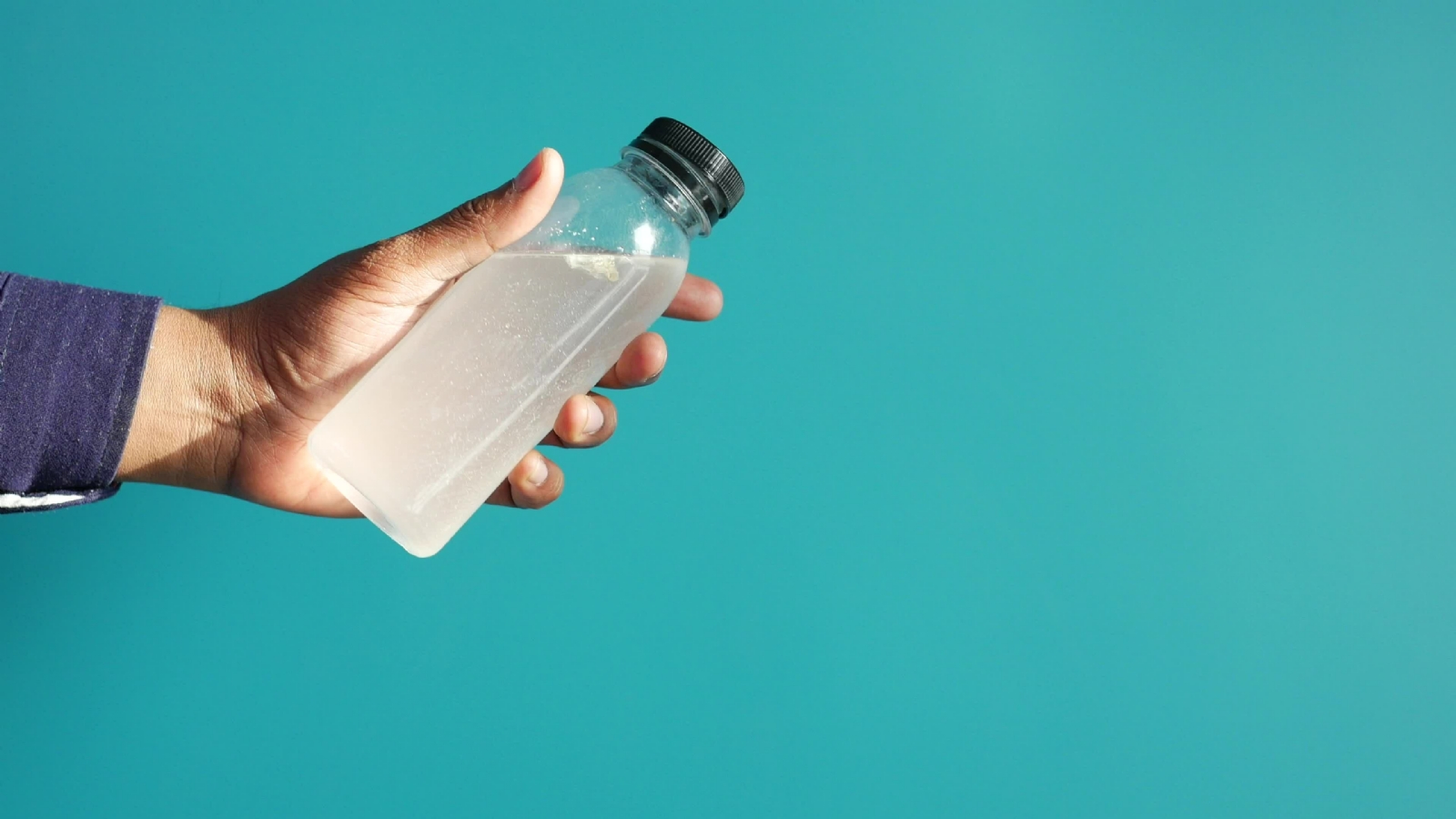 holding-dirty-bottle-of-water-free-video