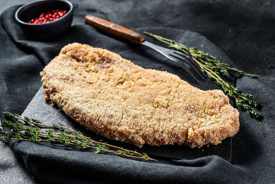 bigstock-homemade-raw-breaded-german-we-353495279_6_928x621