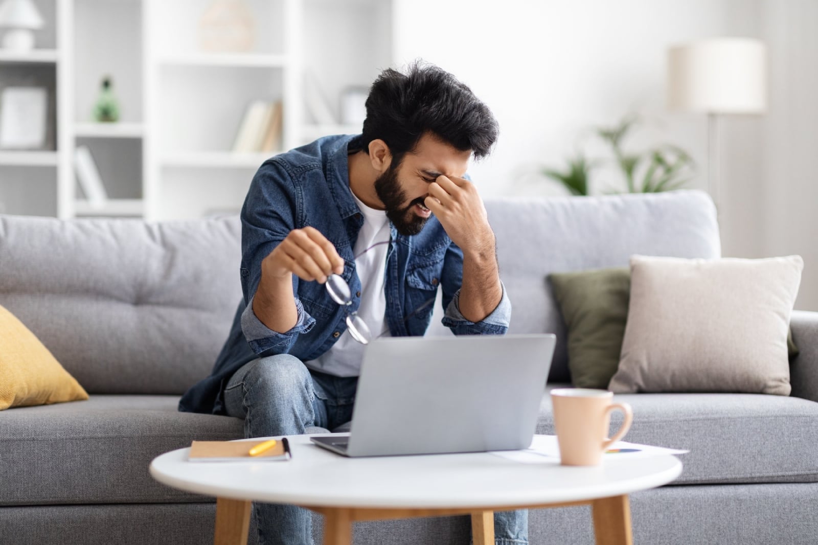 eyes-fatigue-stressed-indian-male-tired-after-wor-2023-11-27-04-58-31-utc