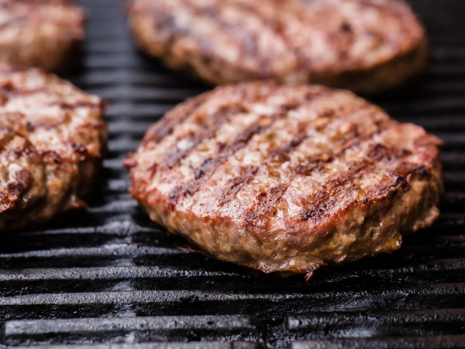 four-burger-patties-grill-marks-grill-2748867