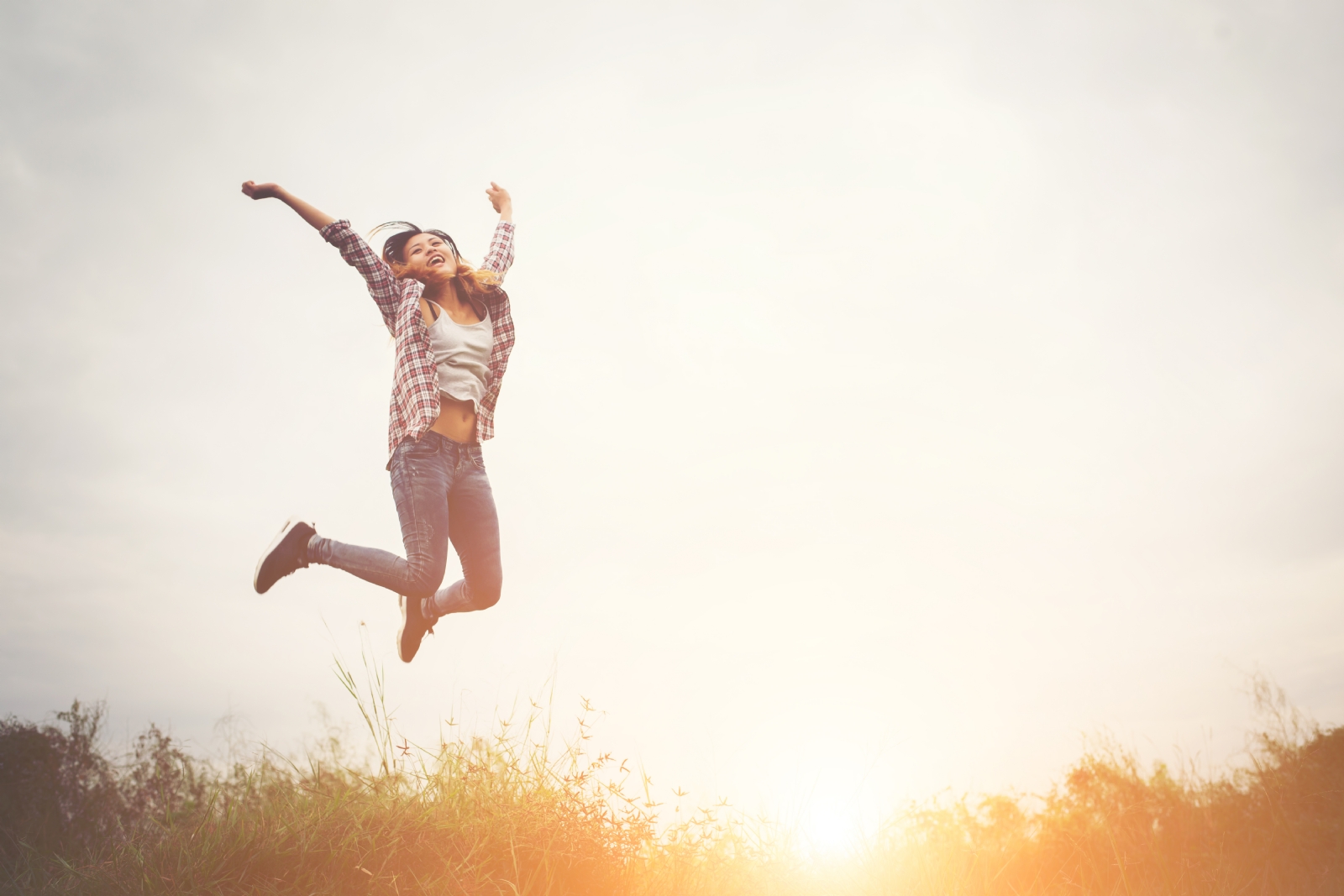 beautiful-hipster-woman-jump-up-high-freedom-enjoying-with