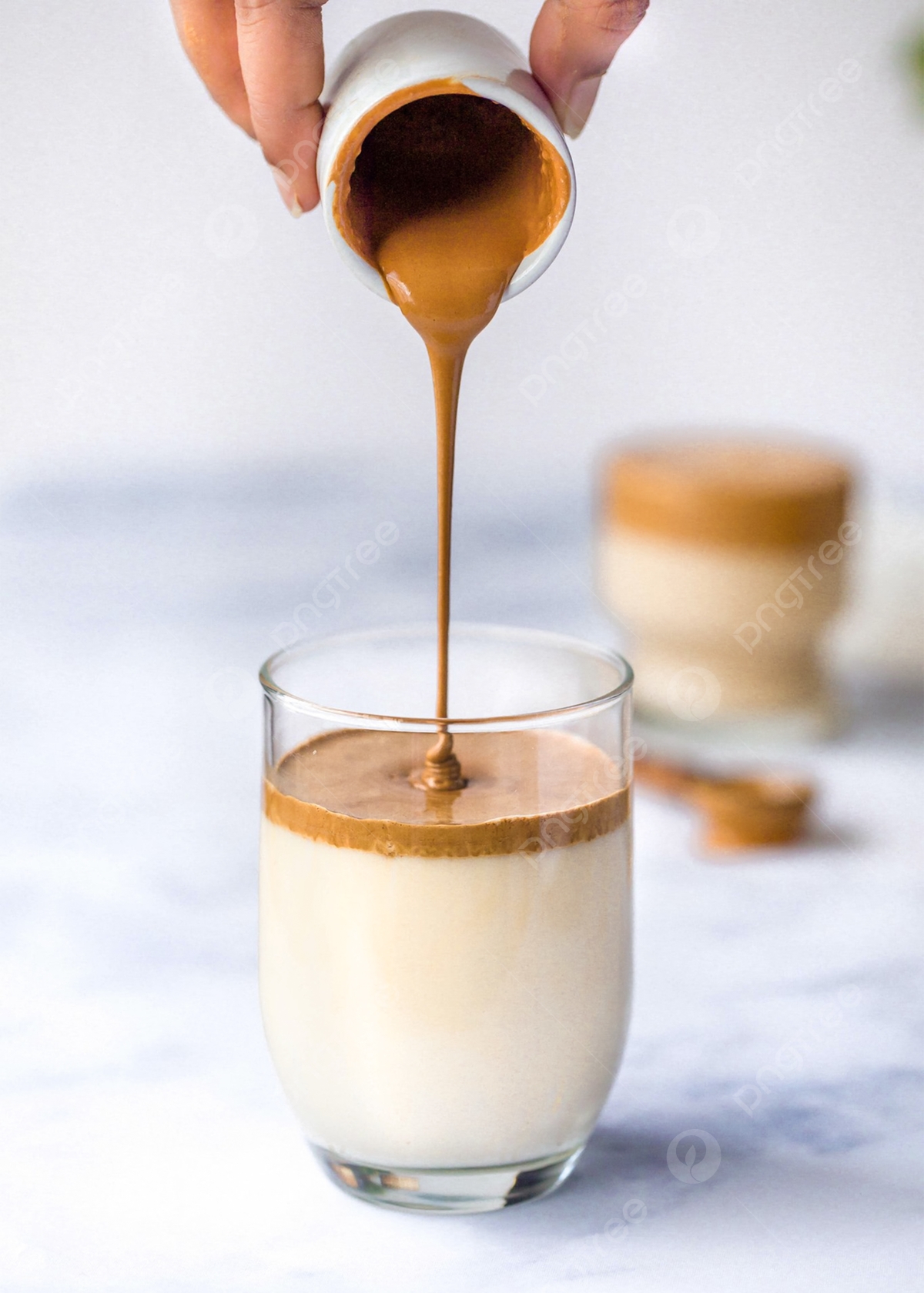 pngtree-pour-dalgona-coffee-foam-glass-and-milk-on-the-white-background-picture-image_1460214