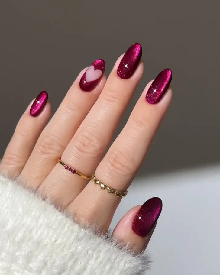 dark-pink-cat-eye-nails-with-heart-nail-art