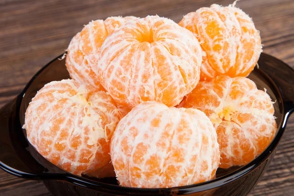 depositphotos_19605495-stock-photo-peeled-tangerines-on-a-table
